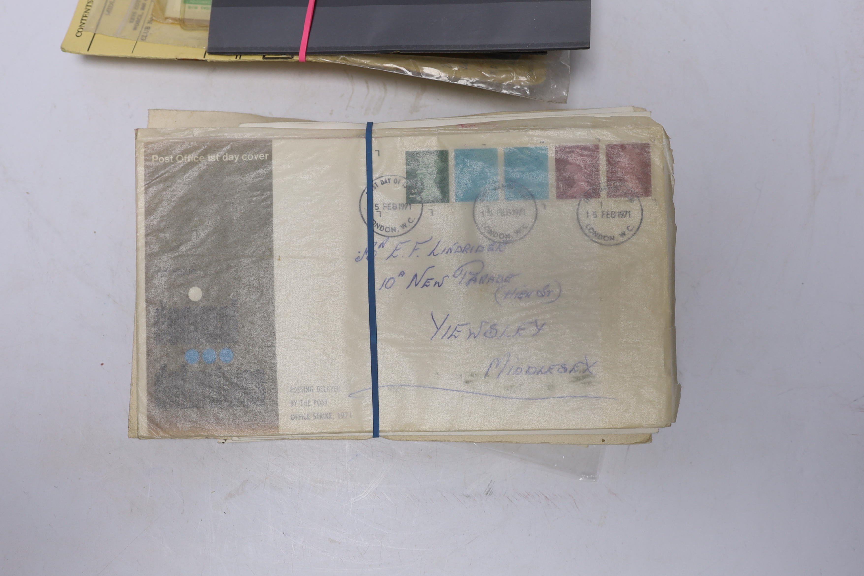 A collection of postage stamps and First Day covers